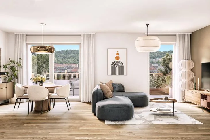Séjour lumineux d'un appartement neuf avec vue